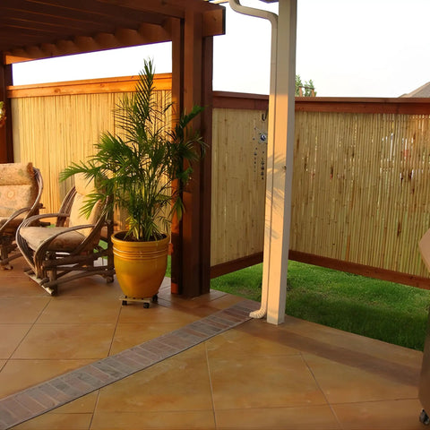 Natural Bamboo Fence Roll Panel 0.75 Inch Thick 6 Foot High By 8 Foot Long for outdoor privacy, shown installed on patio