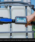 Person holding TT10PN 1 Inch Digital Inline Turbine Chemical Transfer Meter with 4-digit readout, attached to a chemical tank.