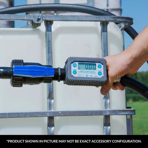 Person holding TT10PN 1 Inch Digital Inline Turbine Chemical Transfer Meter with 4-digit readout, attached to a chemical tank.