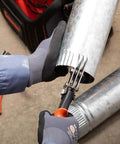 Nine and Three Quarters Inch Five Blade Hand Crimper for Gutters, Downspouts, and Metal Pipe Connections in use on piping
