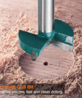 Pro Level Six Piece Forstner Drill Bit Set Equipped With Sharp Carbide Tips For Dead Center Woodcuts On Any Project Includes Six Standard Round Shank Measurements From Fifteen To Forty Millimeters, showing a close-up of a drill bit in wood.