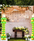 NUOBESTY balloon pillar kit: four adjustable balloon columns in green and yellow with star toppers and stable bases
