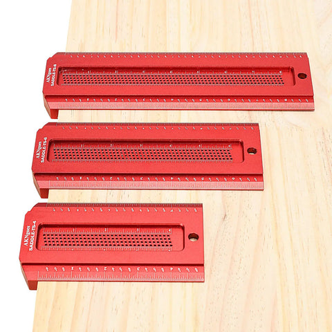 Three red metal Woodworking Saddle T Square Ruler Six Inch For Carpenter Layout And Measuring Tools on a wooden board