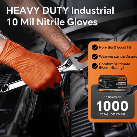 Close-up of orange 10mil nitrile disposable gloves (XL) worn by a mechanic using a wrench