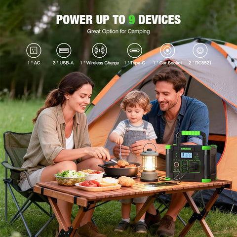 Family camping with Portable Power Station 330W Peak 600W Solar Generator 288Wh next to tent and table setup