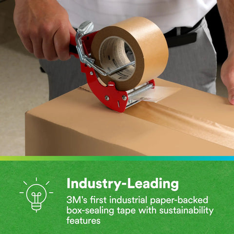 Close-up of a person sealing a box with Game Changing Paper Box Sealing Tape 570 1.9 Inch By 55 Yard Brown Recycle Compatible tape.