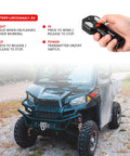 4500 Lbs Electric Winch With Steel Cable And Roller Fairlead For ATV UTV Recovery shown on vehicle with wireless remote in hand