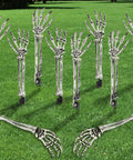 10 Pack Realistic Skeleton Arm Decorations For Garden And Lawn Halloween Decor on green grass
