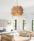 17.3 Inch Rattan Pendant Light, Boho Wicker Chandelier for Dining hanging over a modern bedroom setting.