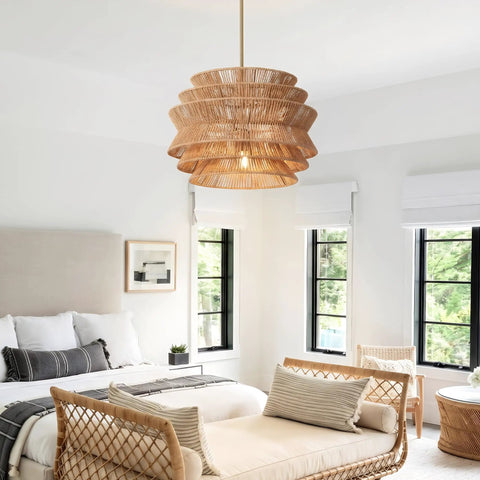 17.3 Inch Rattan Pendant Light, Boho Wicker Chandelier for Dining hanging over a modern bedroom setting.