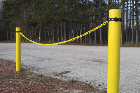 Plastic Barrier Chain In Bright Yellow With 2 Inch Link Diameter And 25 Foot Length Made From High Density Polyethylene UV Resistant installed outdoors