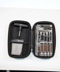 Ultra Compact Pistol Cleaning Kit For Handguns Built Tough For Range Rat Life with brushes in a zippered case.