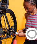 Person repairing bike using Bike Crank Ball Bearings 3 Sixteenth Inch 4 Mm Size, 20 Balls, 10 Pcs Replacement Bottom Bracket Kit