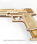 Wolf 01 Handgun 3D Wooden Puzzle Kit For Adults With Mechanical Moving Parts And Realistic Wood Model Gun Brain Teaser And Hobby Set Quick 60 To 90 Minute Assembly No Glue Needed Great Gift For DIYers, side view