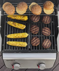 Propane Grill For Outdoor Cooking And BBQ With 2 Burners Black Finish Porcelain-Enameled Cast Iron Grates And Snap-Jet Ignition Ready To Grill Like A Pro grilling burgers and corn with buns on the warming rack