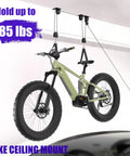 2 Pack Heavy Duty Bike Hoist Pulley System For Garage Ceiling Storage installed with bike hoisted on hooks