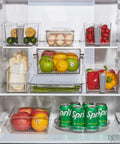 Large 13 Inch Lazy Susan Cabinet Organizer Two Pack Non Slip Clear Turntable Storage Tray in fridge with cans and produce