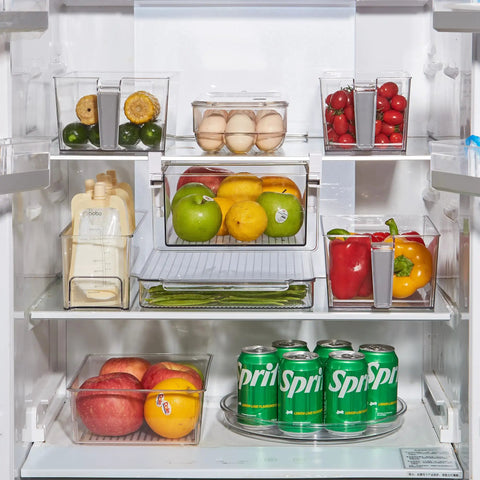 Large 13 Inch Lazy Susan Cabinet Organizer Two Pack Non Slip Clear Turntable Storage Tray in fridge with cans and produce