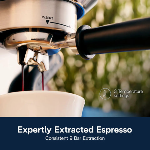 Top Shelf Compact Espresso Machine With Automatic Steam Wand Three Brew Temps Milk Foam Settings Dishwasher Safe Parts 15 Bar Pressure Stainless Steel Design That Hits Different extracting espresso into a white cup.