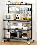 Workhorse Kitchen Bakers Rack With Wheels And Storage, 4 Tier Microwave Stand And Utility Cart, NSF Certified Commercial Metal Shelving, 42 By 18 By 63 Inch, Black, Includes 20 S Hooks, loaded with kitchen items and appliances.