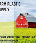 Battle Tested Heavy Duty Clear Pallet Covers 78X155 Inch 2Mil Polyethylene Workhorse Bags near a red barn on a farm.