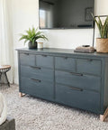 Modern dresser with black 25 pack 5 inch hole center cabinet handles and 6 inch edge pulls in bedroom setting.