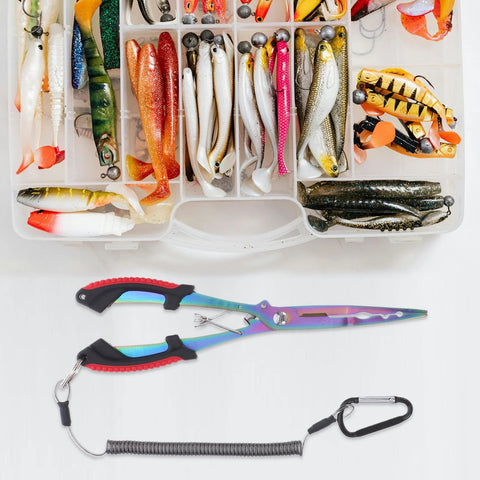 Front view of iridescent stainless steel long-nose fishing pliers with lanyard beside a tackle box filled with lures