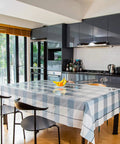 Clear Plastic Table Cover Protector for Tables and Desks, 36x72 Inches, 1.5mm Thick Vinyl Pad on a kitchen table