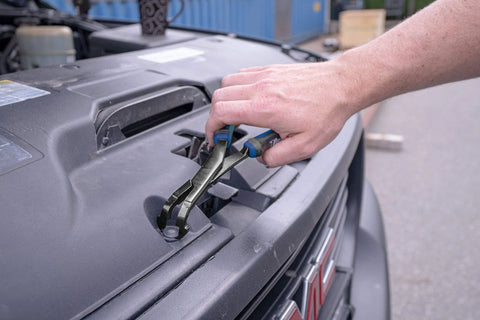 75 Degree U Joint Snap Ring Pliers Pro Grade For Automotive And Medium Duty Trucks Cars Equipment And ATV UTV Angled Push Pin Pliers For Use With Class 1 To 5 Vehicles 70301 in use under a car hood