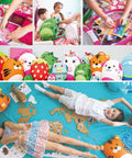 Children with colorful Tiny Trekker Kids Carry On Luggage with playful designs, including a unicorn and tiger, around a world map.
