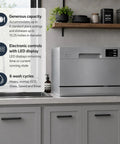 Straight Up Countertop Dishwasher With Six Quick Rinse Cycles And Bright Led Touch Panel Featuring Easy Sink Hookup Digital Timer And Zero Hassle Cleanup For Daily Grinds in a modern kitchen setup, compact silver unit on countertop.