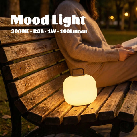 Cordless RGBW LED Table Lamp With Remote Control on park bench, portable outdoor lantern for dimmable mood lighting