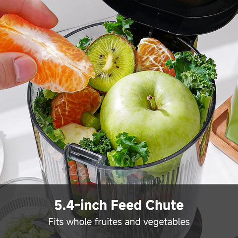 AMZCHEF Cold Press Juicer With 5.4 Inch Slow Masticating Wide Feed Chute showing whole fruits and leafy greens in the 5.4-inch feed chute.
