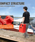 Man carrying Portable 6.34-Gallon Marine Tank With 9.8ft Hose And Gauge For Outboard Engines, Yachts, Fishing Boats And Deck Boats Red