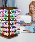 Pretty Slick Wooden 84 Spool Thread Rack With 360 Degree Rotation And Hidden Compartments For Sewing Embroidery Craft Threads Storage Organizer And Needles Bobbins with colorful threads.
