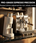 Top Tier Single Dose Coffee Grinder Built For Killer Extraction Features smooth magnetic dosing cup next to espresso machine.