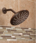 Oil Rubbed Bronze Bathroom Rain Showerhead, 8 Inch Fixed Rainfall Shower Head on tiled wall. One Half Inch IPS Connection, Model 6345ORB.