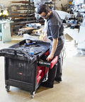 Industrial Tool Storage Cart With Four Drawers And Bright Red Locking Cabinet, Black Finish, 750 Lb Capacity in a workshop
