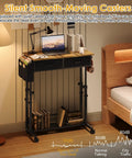 Rolling Height Adjustable Standing Desk On Wheels With Two Fabric Drawers And Storage Shelf Side Pocket And Hook Portable Laptop Table For Home Office Or Small Spaces 31.4 In By 15.7 In Rustic Brown beside a bed in a room.