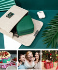 Compact Travel Jewelry Case With Mirror Portable Jewelry Box Organizer in green, inside a beige clutch, surrounded by travel items.