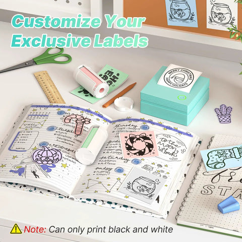 Portable Mini Sticker Printer With Three Thermal Rolls Compact Wireless Label Maker For Teachers And Craft Crews Dead Simple Setup on a desk with planner