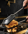 AnNafi Cast Iron Sandwich Maker Stove Top Grill Press Non Stick Hand Toaster Pan For Gas Flame with grilled cheese.