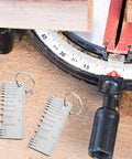 Three Piece Stainless Steel Wire Gauge Measuring Tool Set For Wire And Metal Sheet Thickness on workshop table