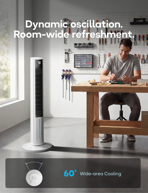 Man using windowless portable evaporative cooler with 1 gal tank, 4 ice packs, 12 hour timer, 60 degree oscillation in workshop
