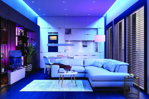 Living room with Connected Max Smart Tape Light Starter Kit with Color Changing LED Tape under cabinets and shelves