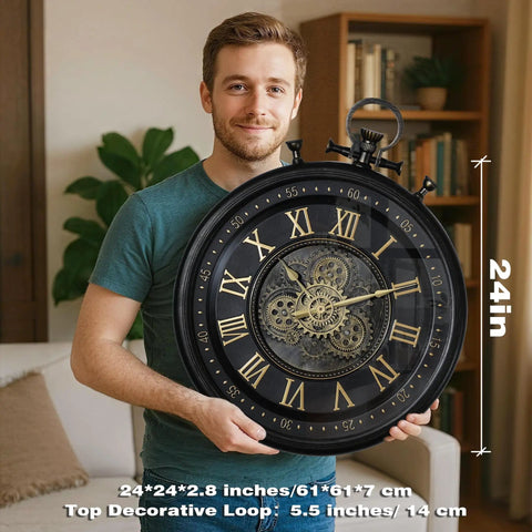 24 Inch Moving Gear Wall Clock Oversized Industrial Steampunk Decor With Big Numerals Carbon Black Finish, held by a person.