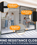 Two Car Garage Door Screen With Retractable Fiberglass Mesh Weatherproof Magnetic Closure Weighted Bottom Easy No Tools Install Tie Back Design 7 Ft High By 16 Ft Wide shown installed with wind resistance features highlighted.