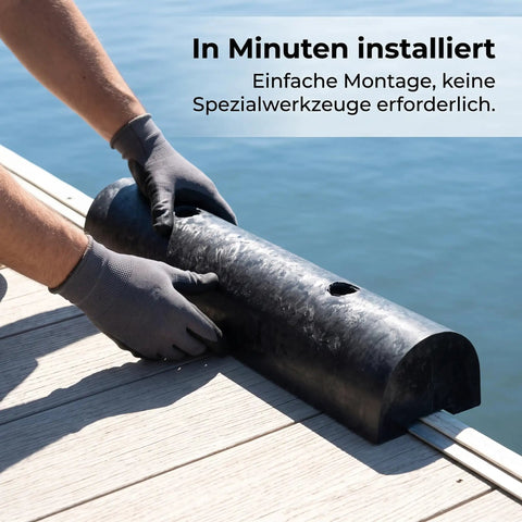Person installing Beefy Rubber Dock Bumper And Semi Circular Dock Guard, marine-grade, black, on pier for protection.