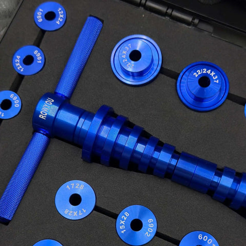 Pro Grade Bike Bearing Press Kit With 35 Adapters, Headset Press Tool, Carry Case, showing blue aluminum alloy press and adapters