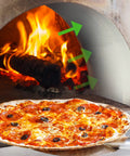 Pizza with pepperoni and black olives near a glowing curved metal kiln door with flames